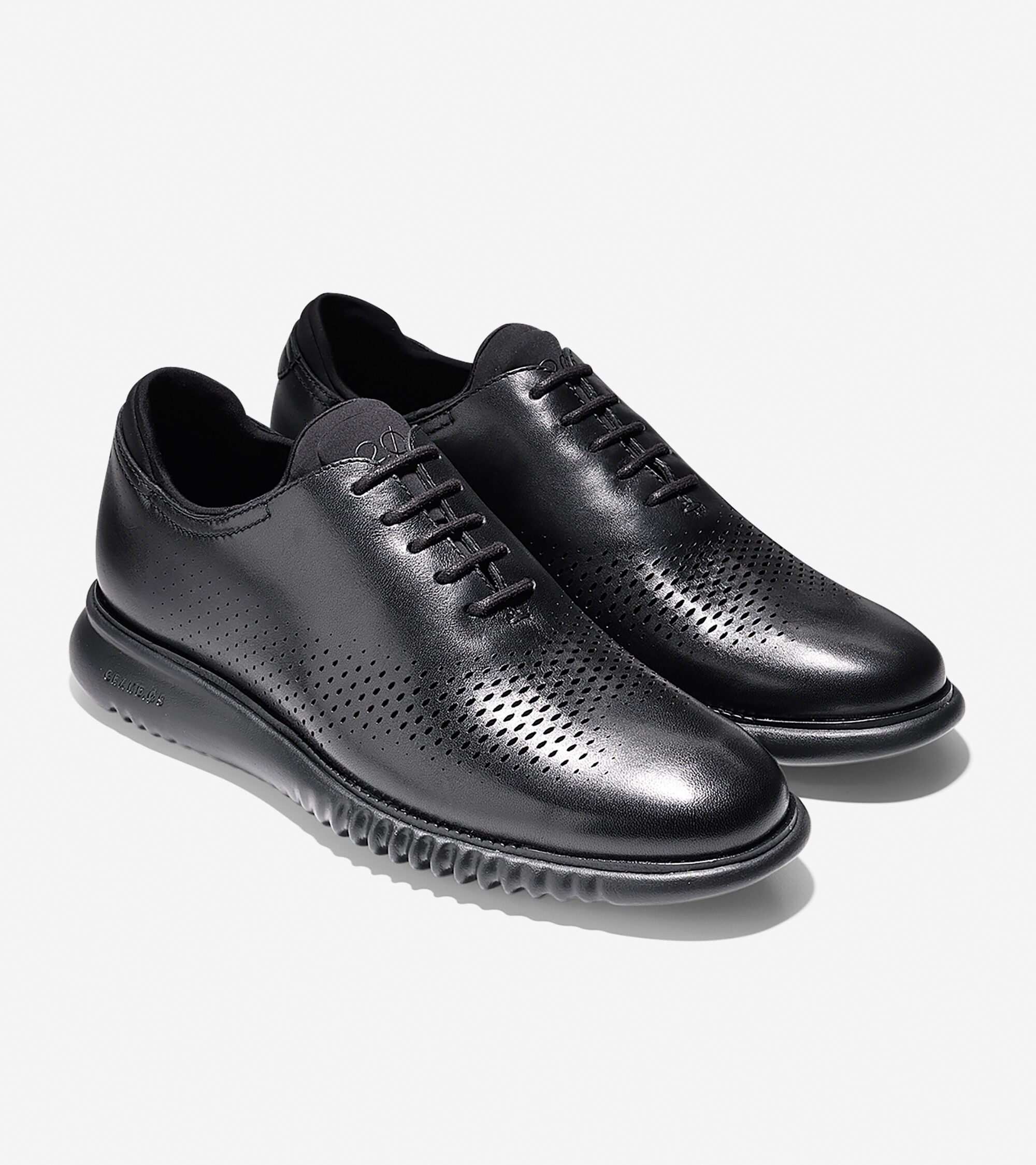 Men's 2.ZEROGRAND Laser Wingtip Oxfords in Black | Cole Haan ZERØGRAND Laser Wingtip Oxford · Men's 2.ZERØGRAND Laser Wingtip Oxford ...