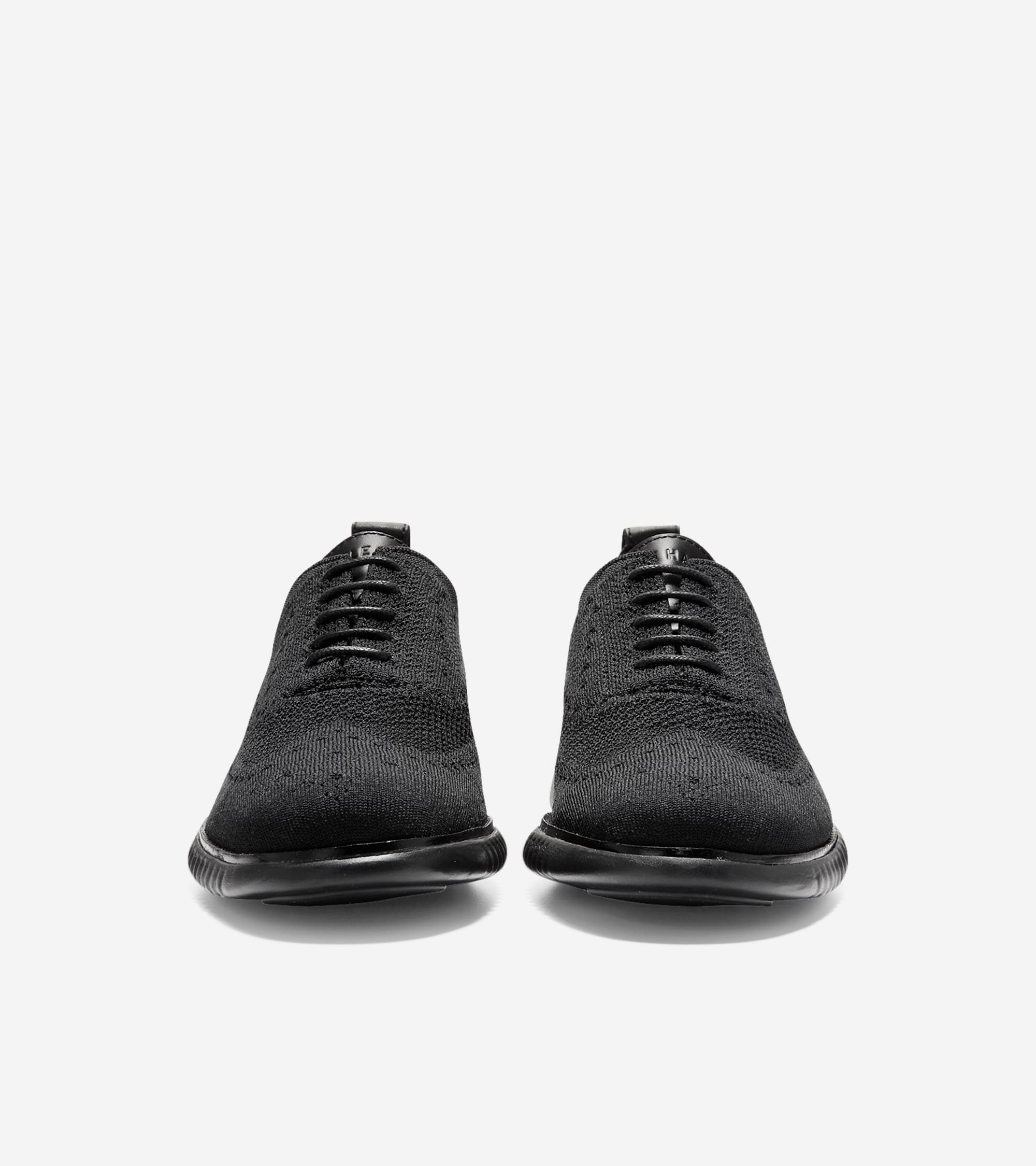 Men's 2.ZERØGRAND Stitchlite™ Wingtip Oxfords in Black | Cole Haan