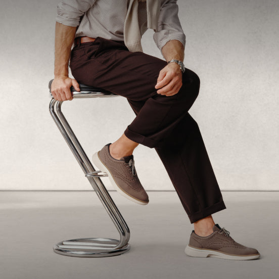 Man wearing brown oxfords