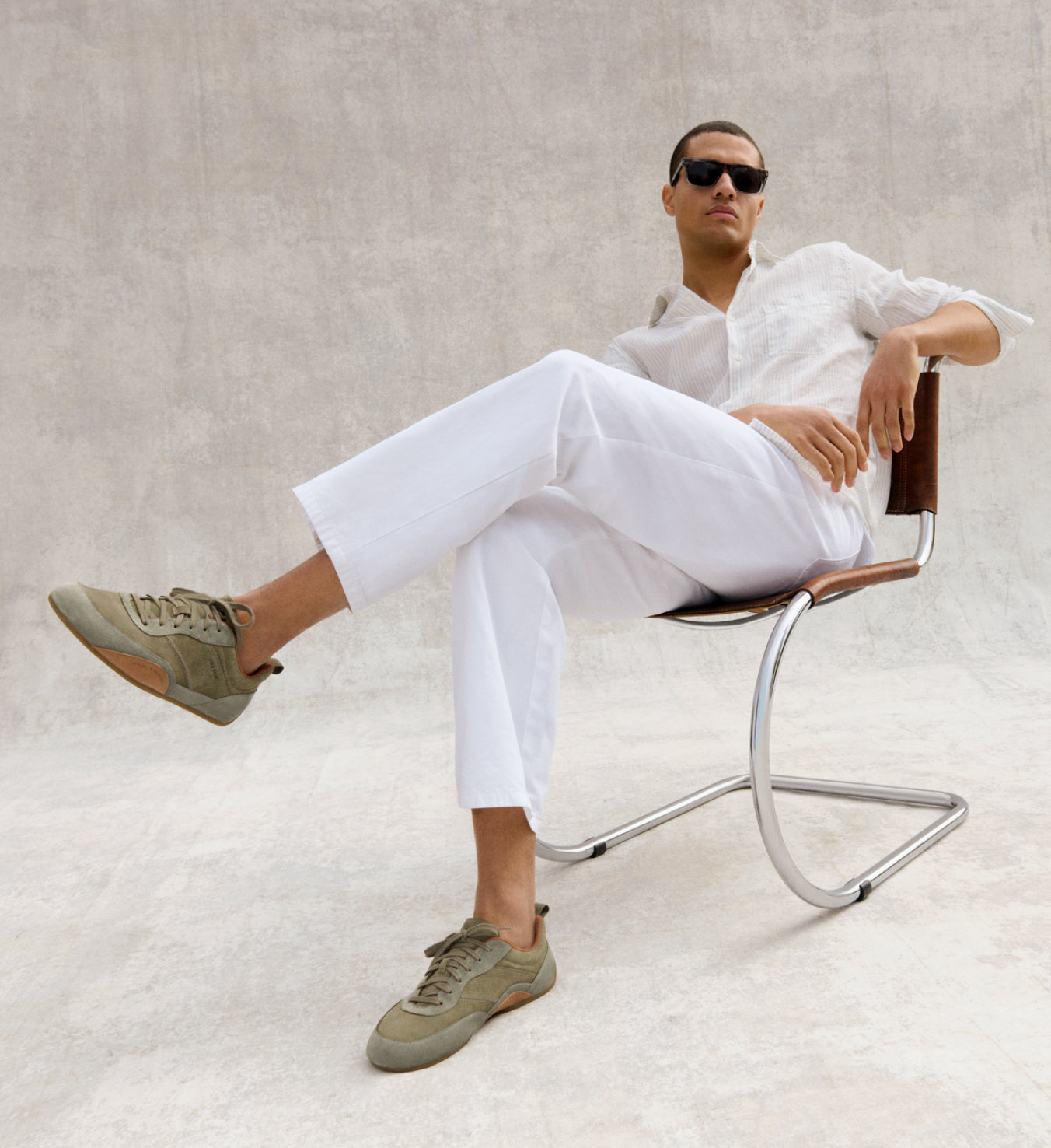 Man wearing green sneakers