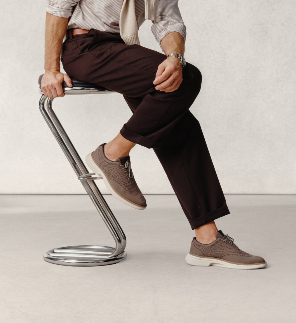 Man wearing brown oxfords