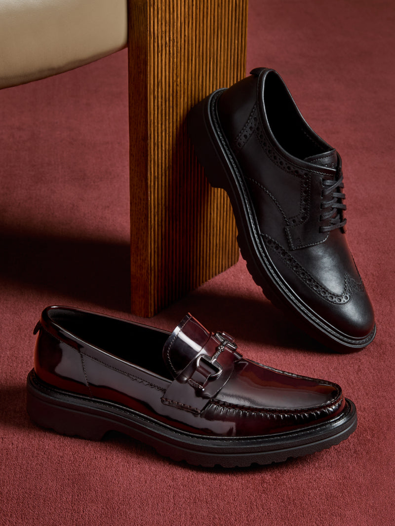 Black oxfords and red loafers