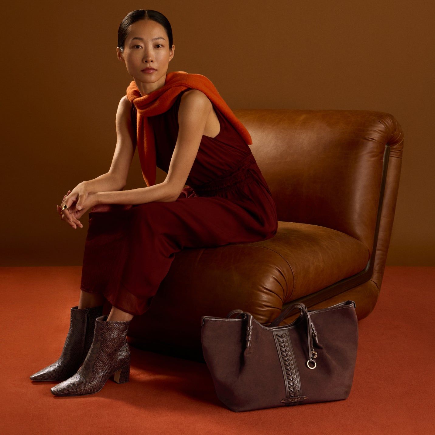 Woman wearing brown booties