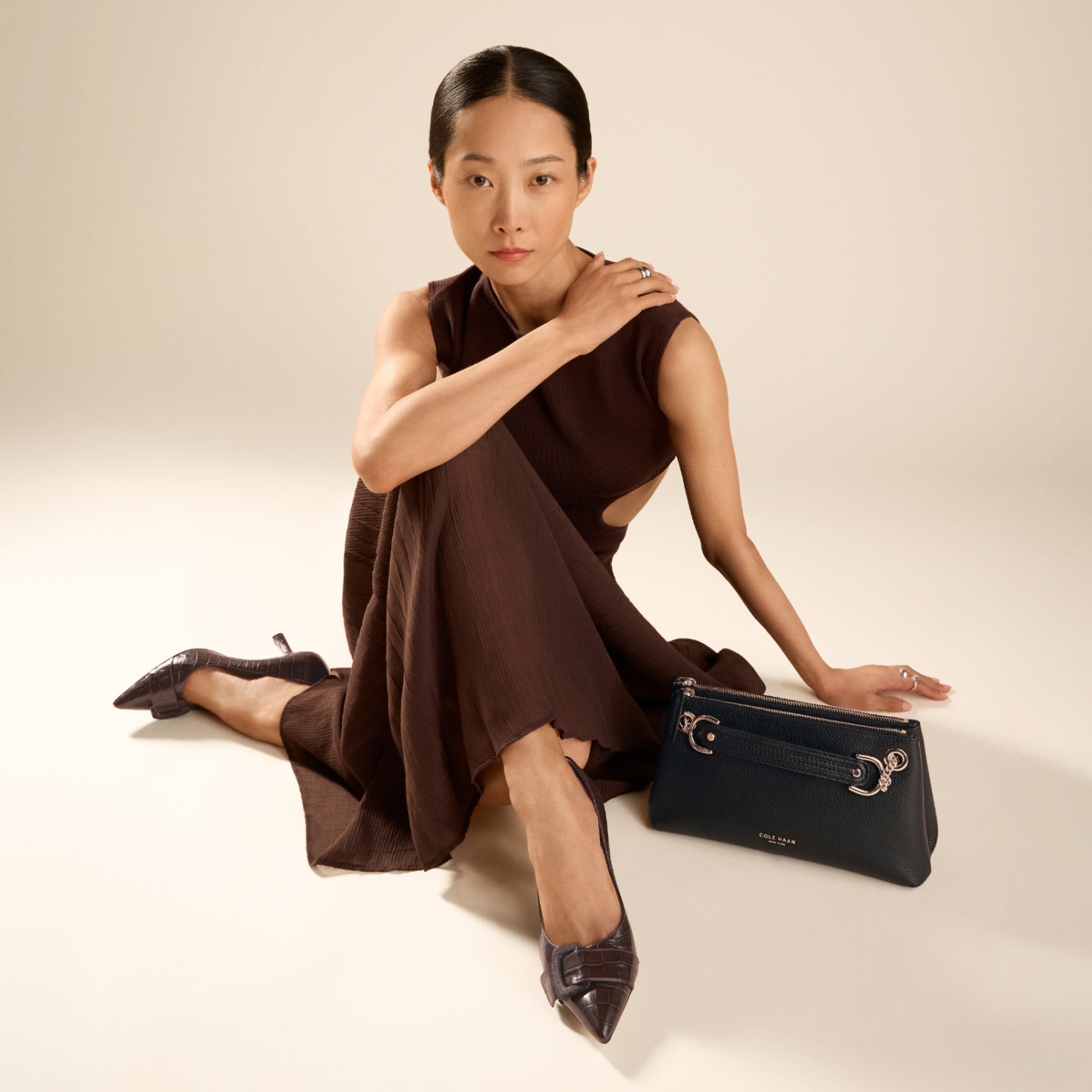 Woman wearing dark pumps