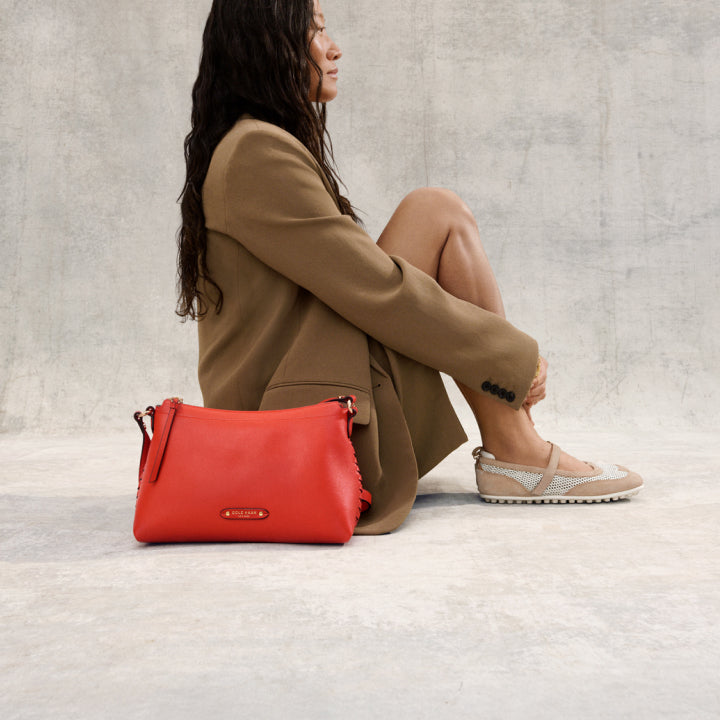 Woman wearing beige flats