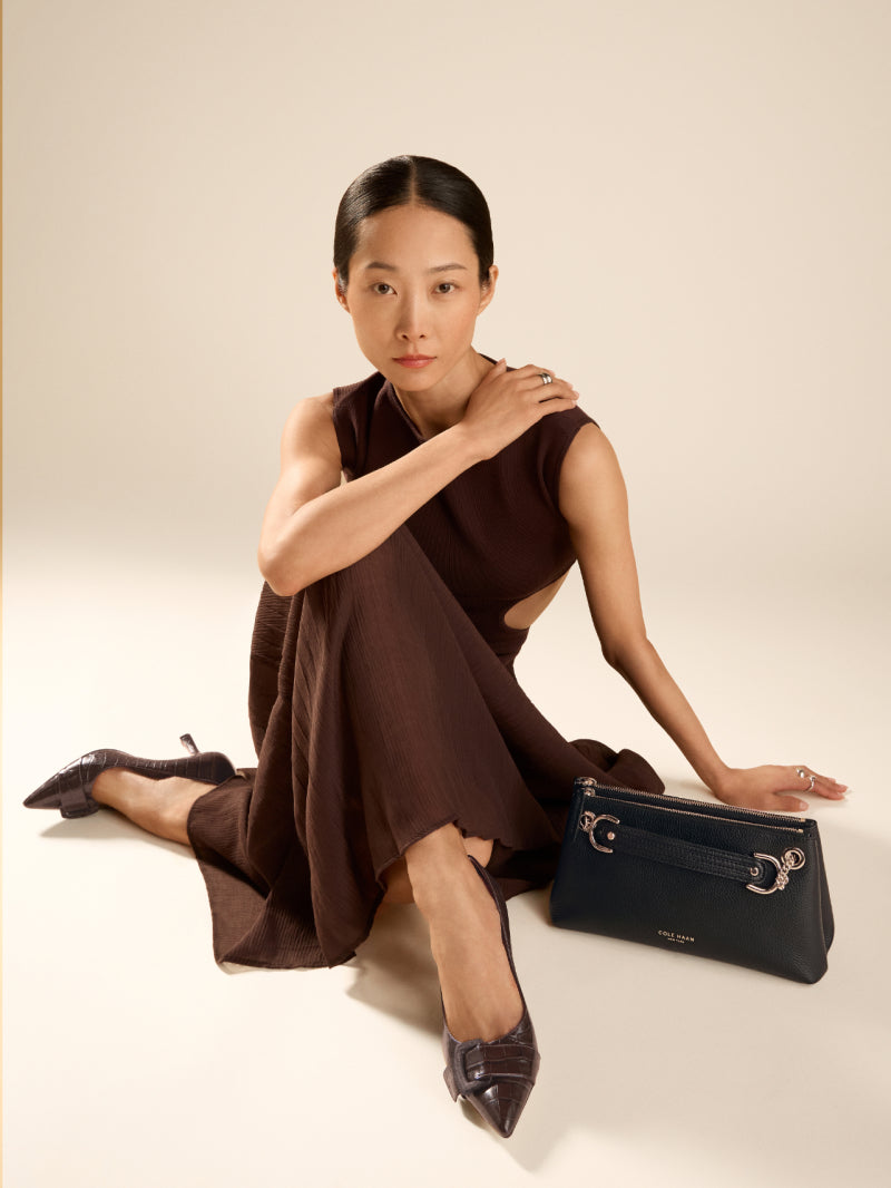 Woman wearing dark pumps