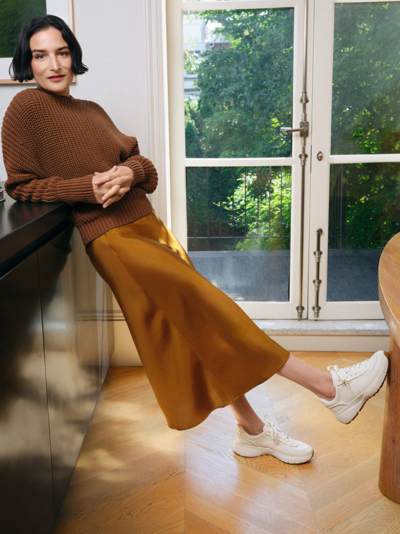 Woman wearing white sneakers