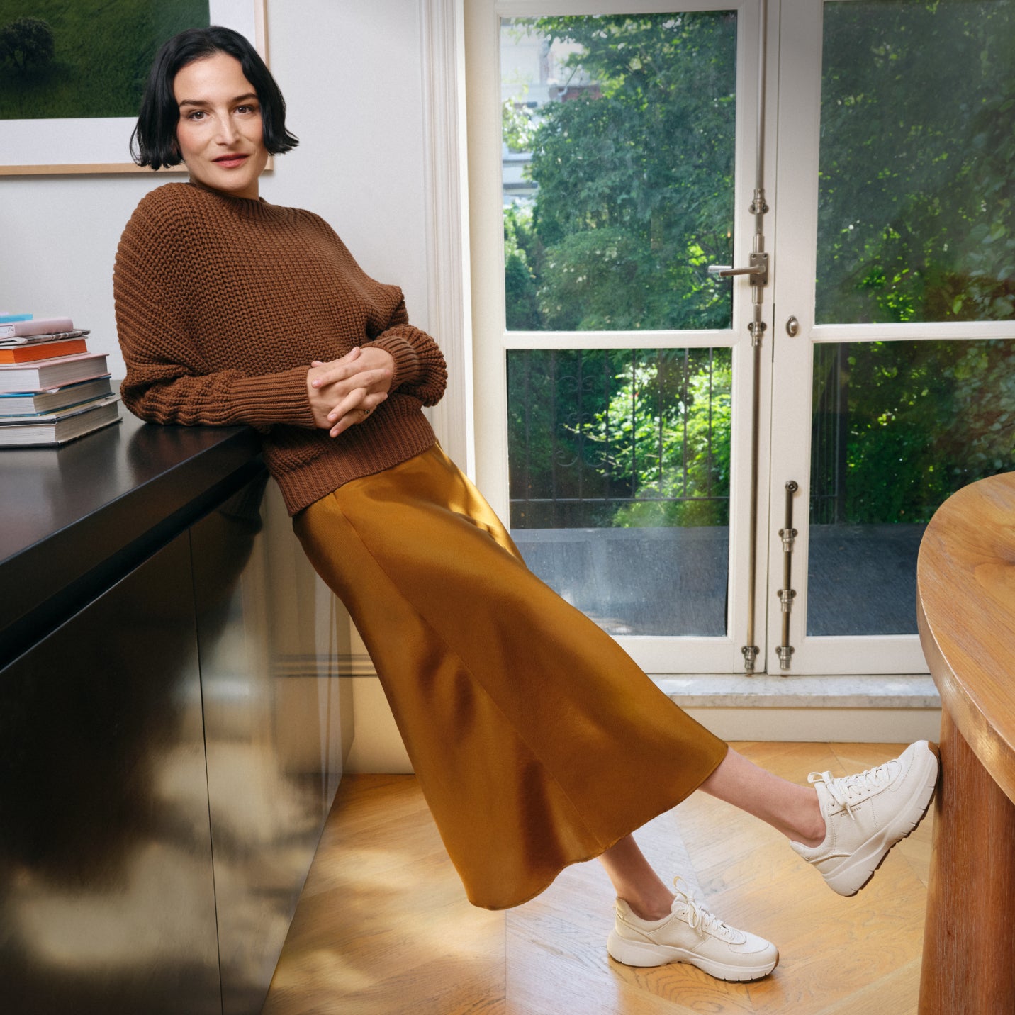 Woman wearing white sneakers