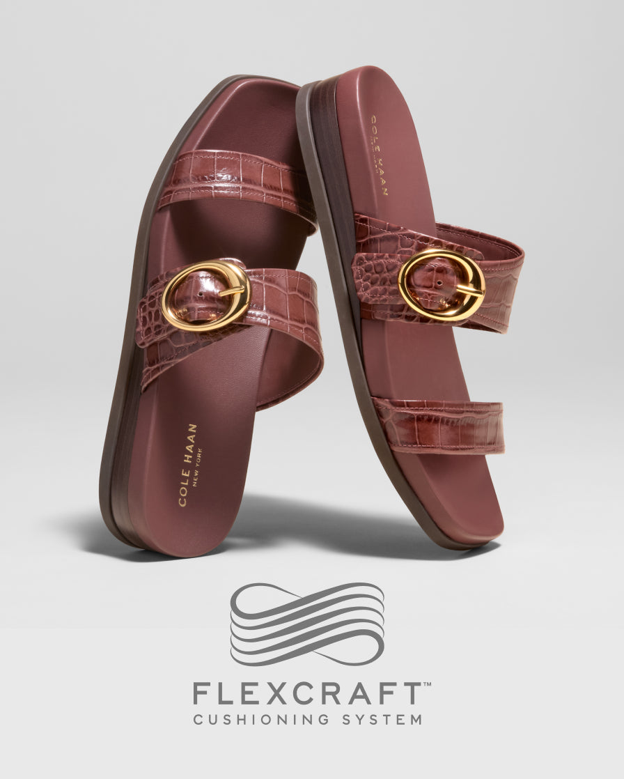 Brown leather sandals with gold buckle