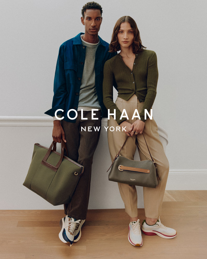 Man and woman holding bags and wearing sneakers