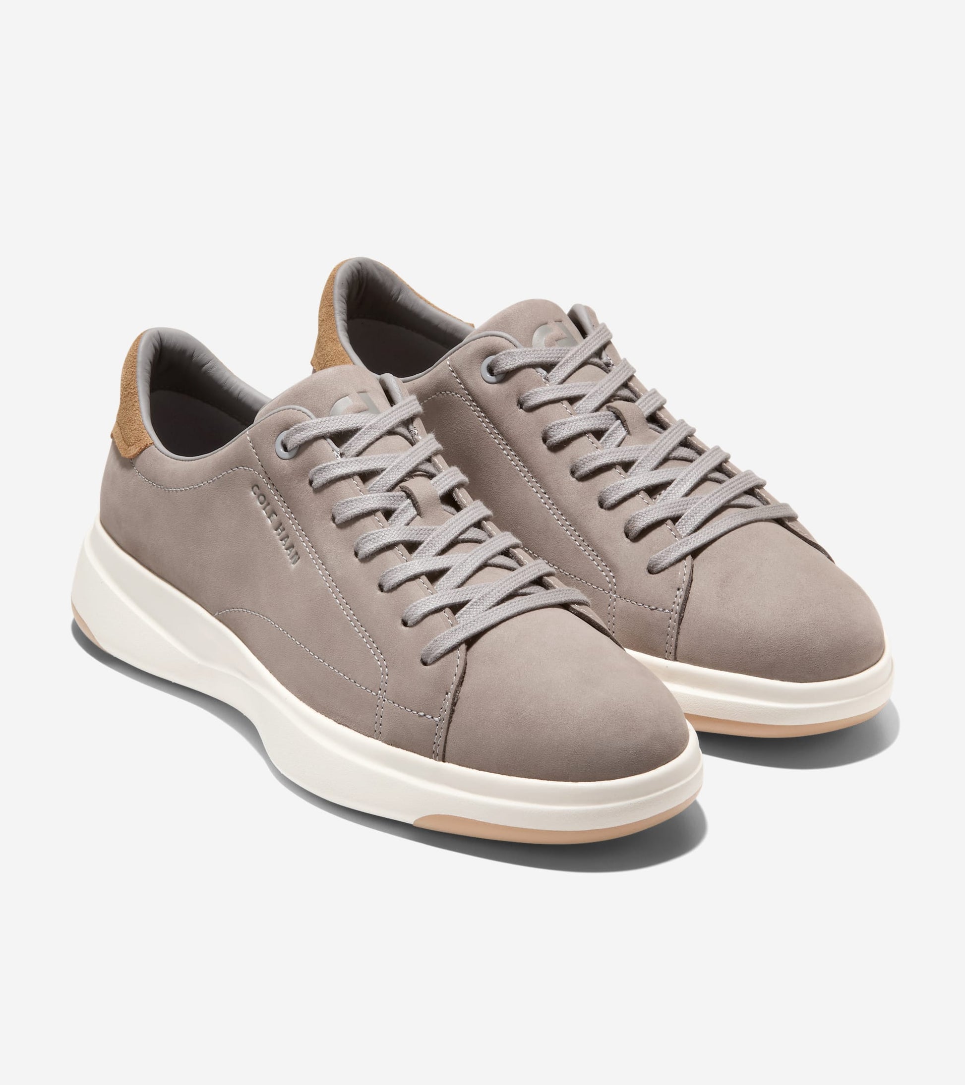 cole haan dress sneakers Men's riginalGrand 2.0 Oxford Sneaker These Cole Haan Grand Court Sneakers are high on style and comfort Cole Haan Men's GrandPr Angleace