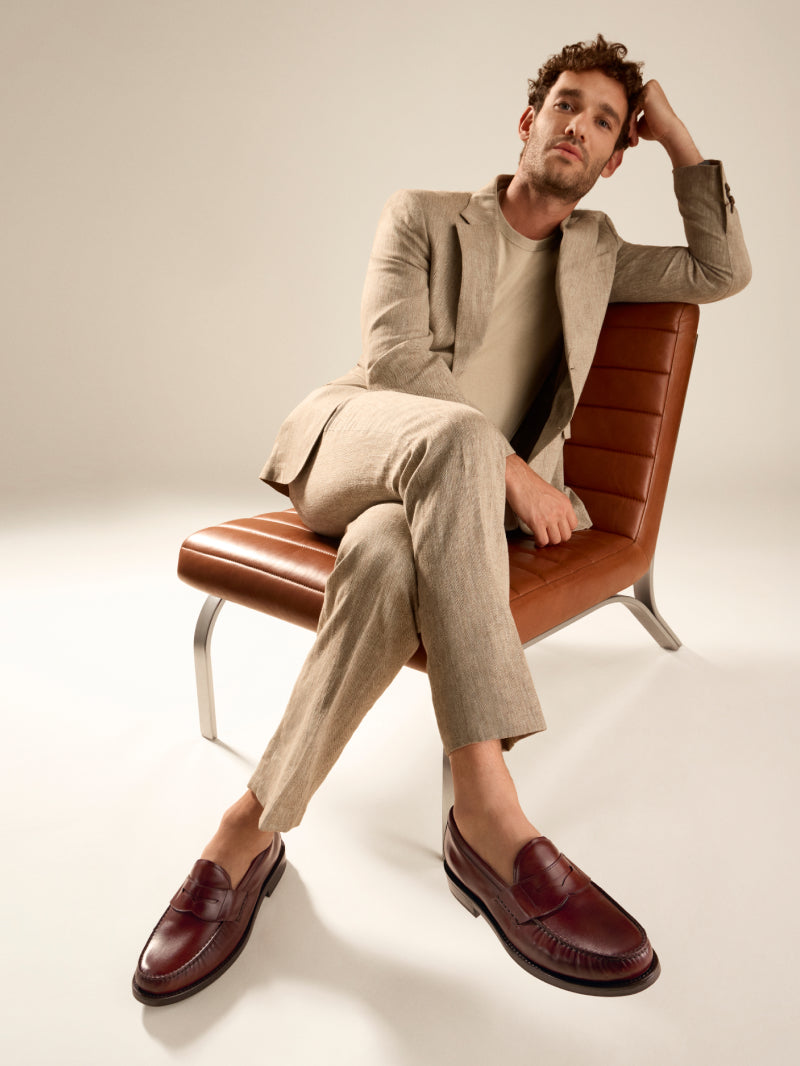 Man wearing brown loafers