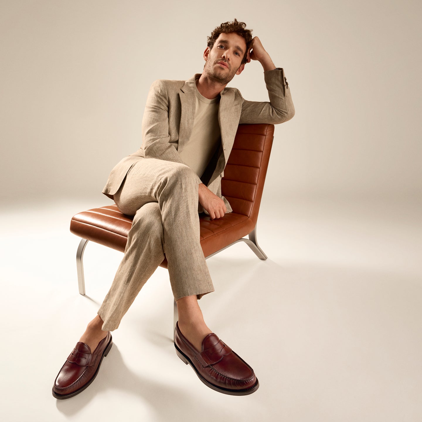 Man wearing brown loafers
