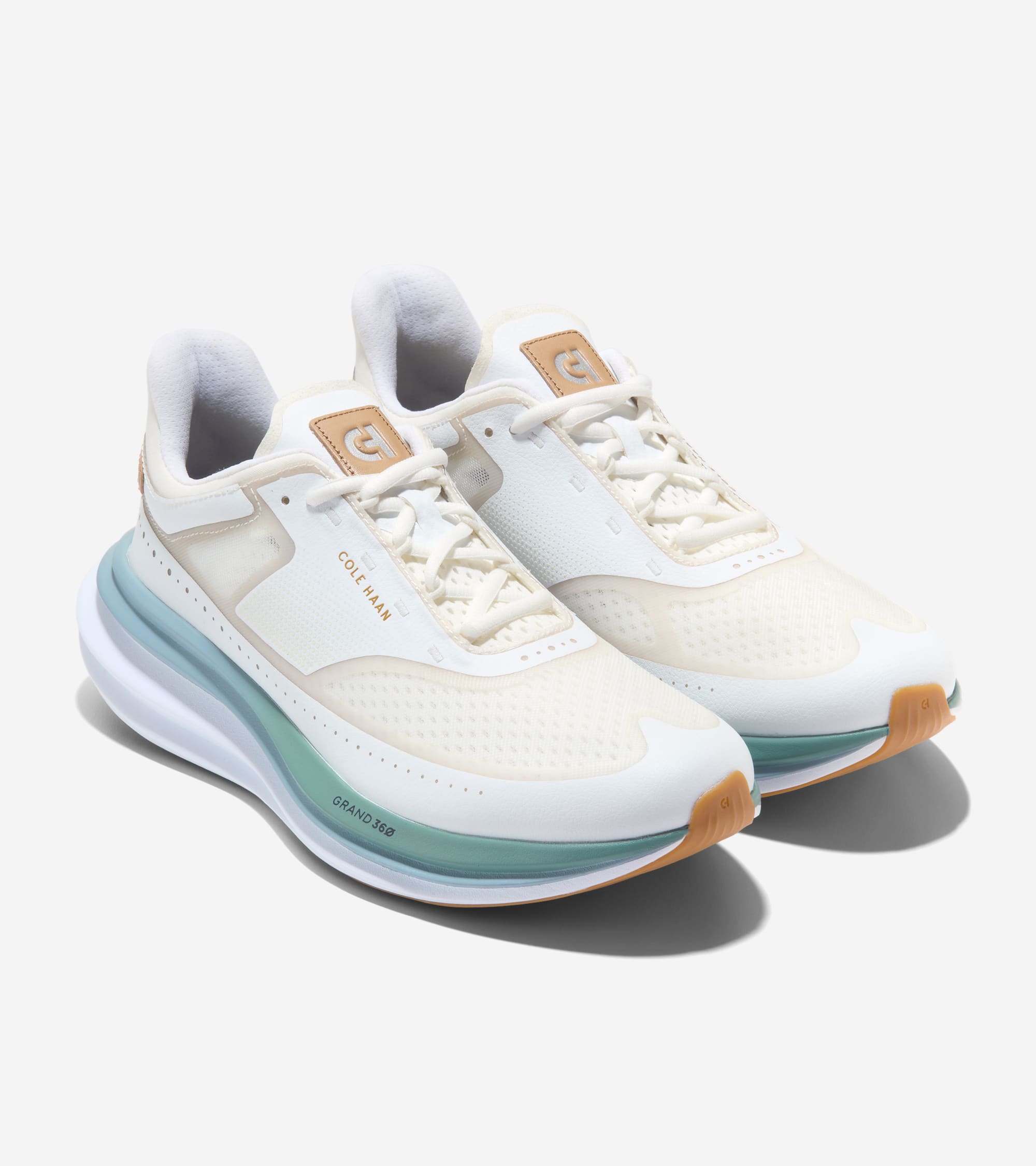 c k Men's ØriginalGrand Quadstar Running Sneakers in White | Cole Haan