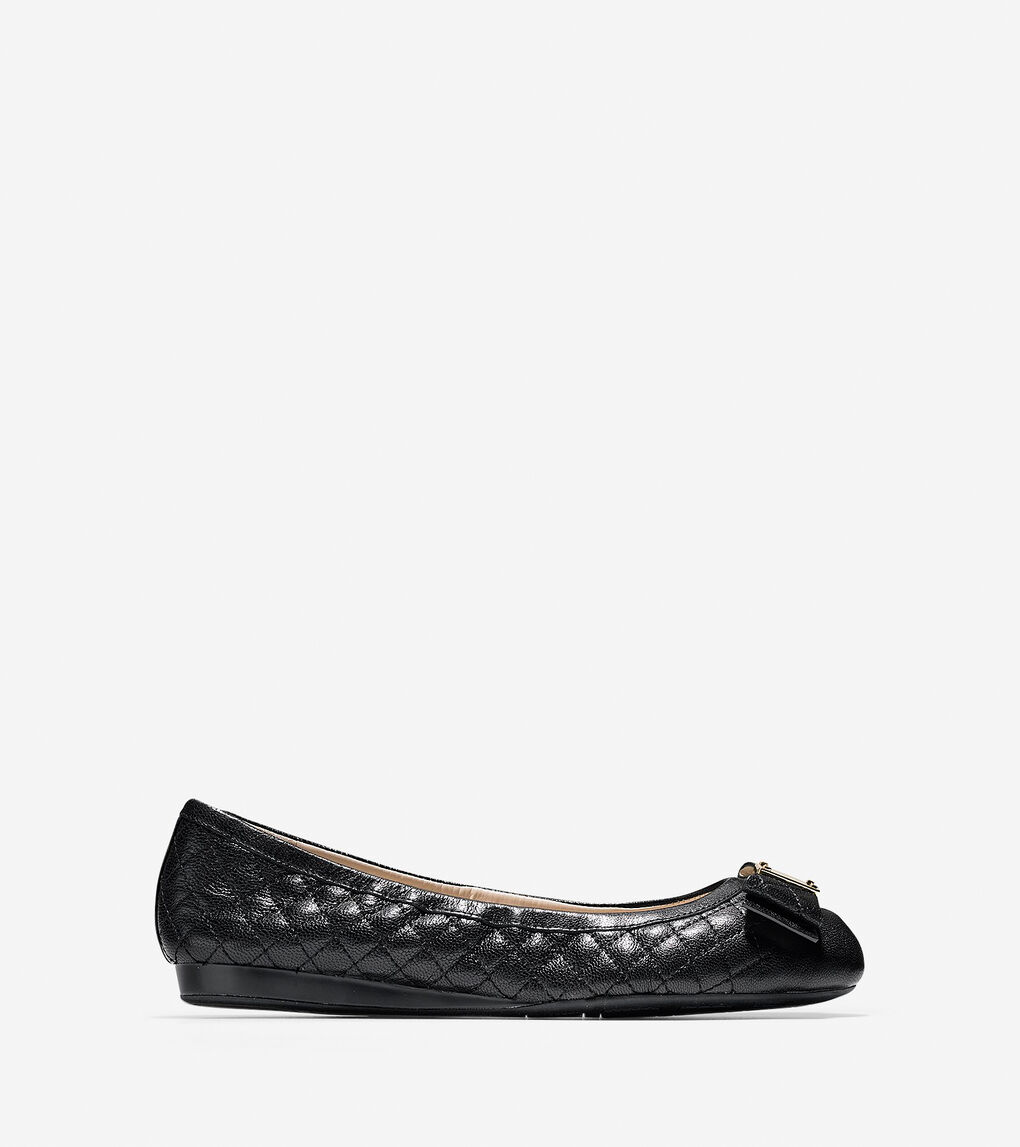 black ballet flats with bow