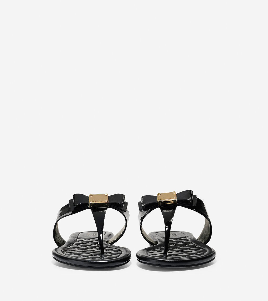 Womens Tali Bow Flat Sandals in Black Patent | Cole Haan