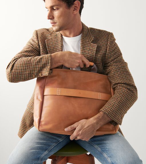 Male Model carrying a Men's Bag