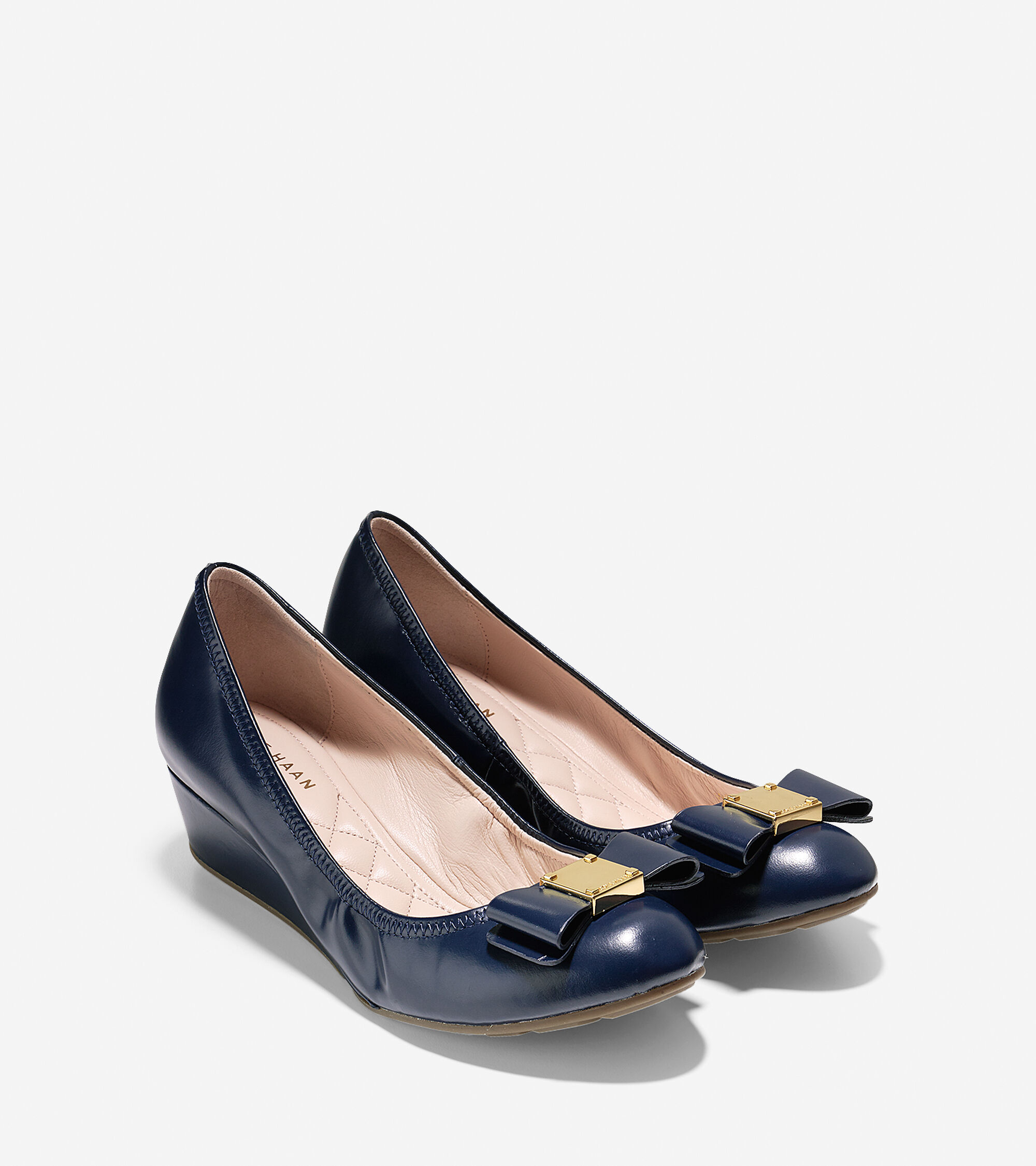 tali grand bow wedge pumps