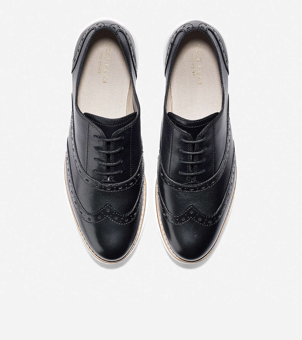 black and white wingtip oxfords